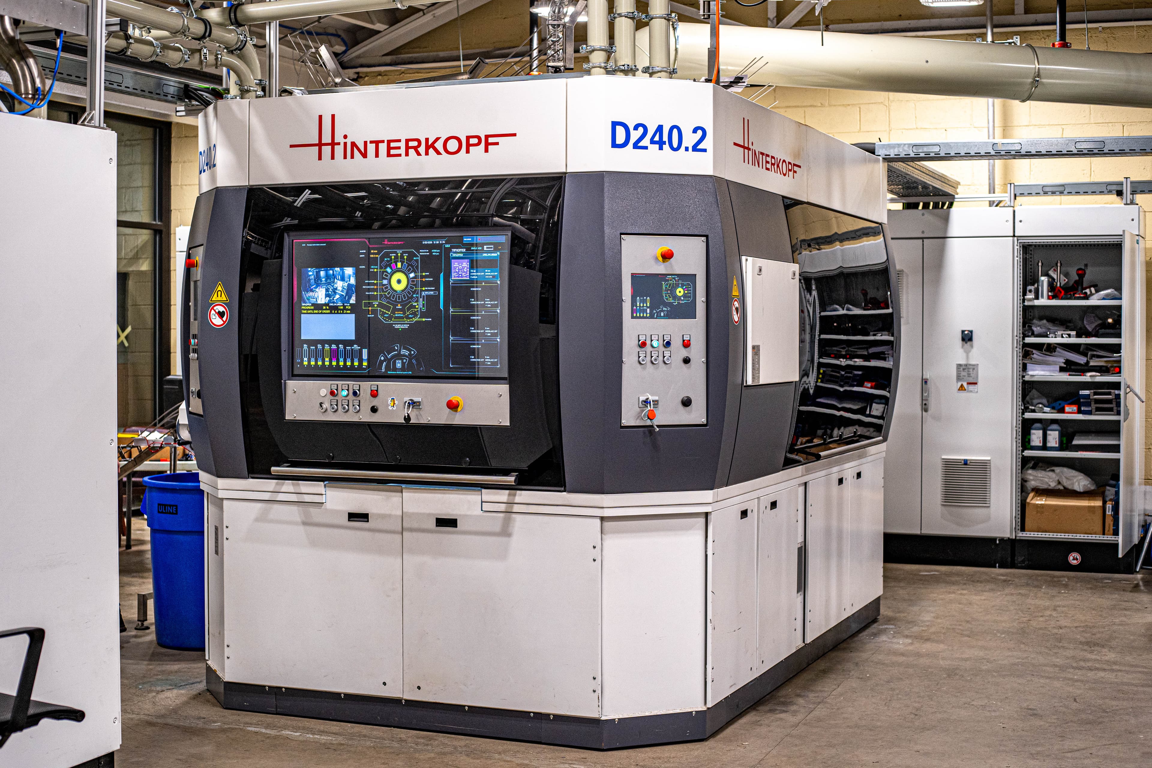 Custom printed cans moving from print to the fill line